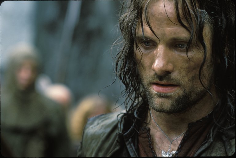 Aragorn (Viggo Mortensen) rides into Helm’s Deep